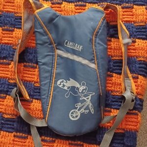 CamelBak Blue and Orange Youth Hydration Pack SKEETER Model with Biking Graphic